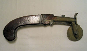 Click to enlarge a nice, original match ignited powder tester, circa 1750