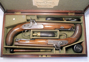 Click to enlarge a fine cased pair of 15 bore officers percussion pistols by Westley Richards
