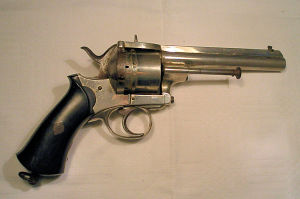 Click to enlarge a 6 shot 12mm double action Francotte pinfire revolver retaining nearly all it's original nickel plated finish, apart from one small loss on the underside of the butt strap